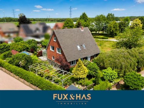 Traumhafter Garten trifft auf viel Wohnfläche in Lohne: Einfamilienhaus mit Wintergarten!, 49835 Wietmarschen / Lohne, Einfamilienhaus