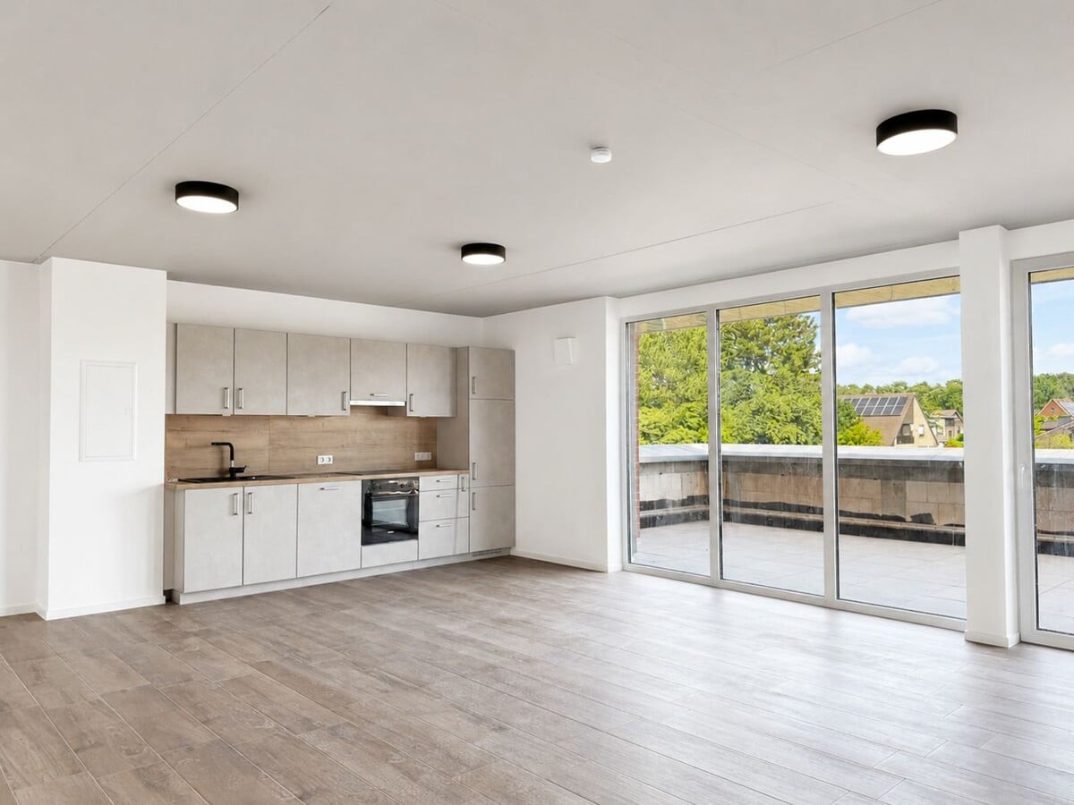 Gemeinschaftsraum mit Küche und Balkon